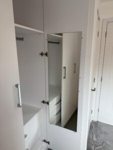 Bespoke fitted hinged wardrobe interior in Kent