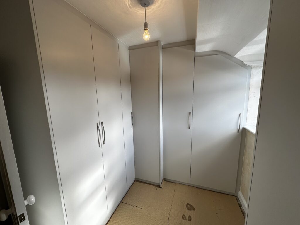 Bespoke fitted corner hinged wardrobe in Chatham, Kent