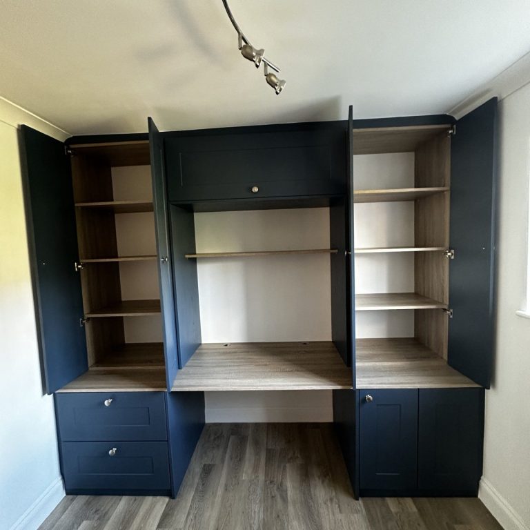 Bespoke fitted, tailor made home office with pull out trays, drawers and overhead storage in Kent.